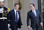 Bekymring. Nicolas Sarkozy og  Francois Hollande efter et møde om situationen i Frankrig. 