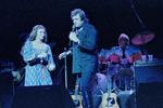 Johnny Cash og June Carter Cash optræder i New Yorks Radio City Music Hall i 1985. Op igennem 70'erne og 80'erne forsatte Cash med at spytte album ud. Samtidig begyndte han at medvirke i flere film. På trods af produktiviteten var hans succes imidlertid dalende. I 1980 blev han dog som den yngste levende kunstner indviet i countrymusikkens Hall Of Fame. 
