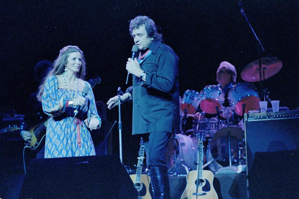 Johnny Cash og June Carter Cash optræder i New Yorks Radio City Music Hall i 1985. Op igennem 70'erne og 80'erne forsatte Cash med at spytte album ud. Samtidig begyndte han at medvirke i flere film. På trods af produktiviteten var hans succes imidlertid dalende. I 1980 blev han dog som den yngste levende kunstner indviet i countrymusikkens Hall Of Fame. 