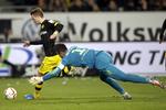 tæt. Der blev scoret to gange i overtiden, efter Marco Reus (tv) havde bragt Dortmund foran 1-0 tidligere i kampen mod Wolfsburg. 