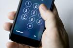 Iphone med nummer skive og hånd