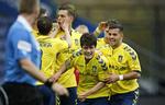 hæder. Riza Durmisi (th) vandt prisen som årets spiller i Brøndby foran anfører Daniel Agger (midt). 