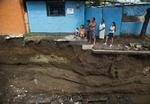 Konsekvens. Den lille mellemamerikanske nation Nicaragua har åbent erklæret, at det ikke har tænkt sig at lave en klimaplan.  Her er en vej skyllet væk efter voldsom regn i hovedstaden Managua. 