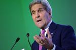 Pengeregn. USA fordobler sit bidrag til verdens fattigste lande, meddeler udenrigsminister John Kerry i Paris. Danmark skærer ned. 