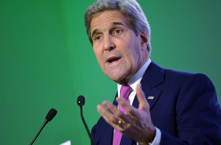 Pengeregn. USA fordobler sit bidrag til verdens fattigste lande, meddeler udenrigsminister John Kerry i Paris. Danmark skærer ned. 