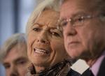 forbeholden. IMF's chef, Christine Lagarde, har ikke fundet anledning til at tage den optimistiske nytårstale frem. 