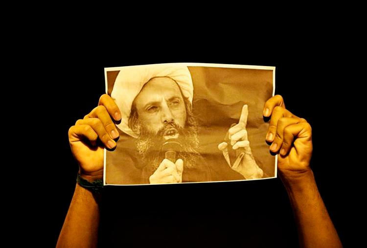 heltestatus. Overalt i den shiamuslimske verden bliver der disse dage vist billeder af Nimr al-Nimr som led i protesterne mod hans henrettelse. 
