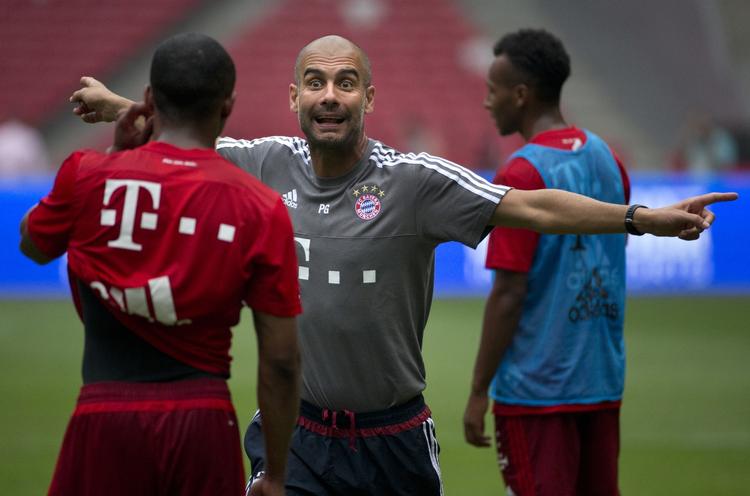 engageret. Træner Pep Guardiola (midt) har ført sine tidligere klubber, Barcelona og Bayern München, frem til store titler. 