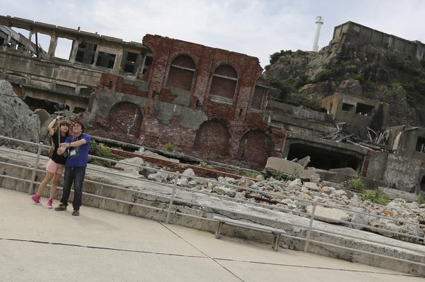 Gunkanjima står som et symbol på industrialiseringen i Japan. I dag er øen en turistattraktion. 