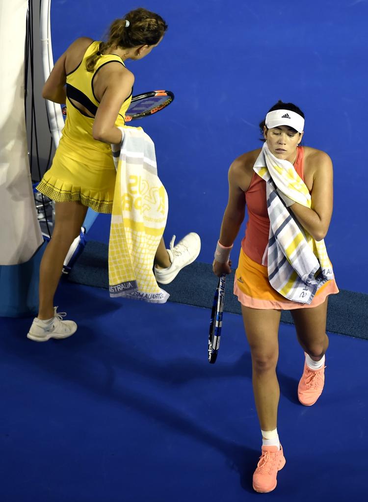 Exit. Muguruza (th) var seedet til en plads i semifinalerne, men får nu i stedte en ekstra uges ferie. 