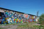 KØBENHAVN. Besluttede på bycykel at cruise ud over Knippelsbro. Målet: Margretheholm og Quintus Bastion. Pludselig dukker de op. Nedlagte garageanlæg? Herude i Københavns baghave havde graffitimalere haft total arbejdsro. 
