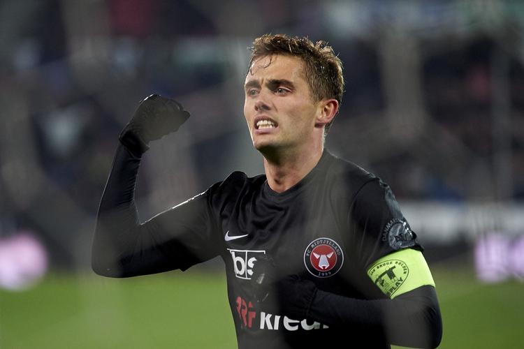 Jakob Poulsen er 34 år og en erfaren midtbanemand, der har spillet 45 A-landskampe. Han kan måske 'stjæle' Mike Jensens plads i VM-truppen? 