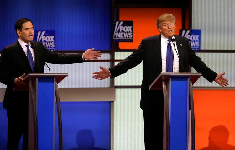 Foran. Donald Trump fører klart det republikanske felt foran Ted Cruz  og Marco Rubio ( venstre), men kan risikere ikke at få flest delegerede. 