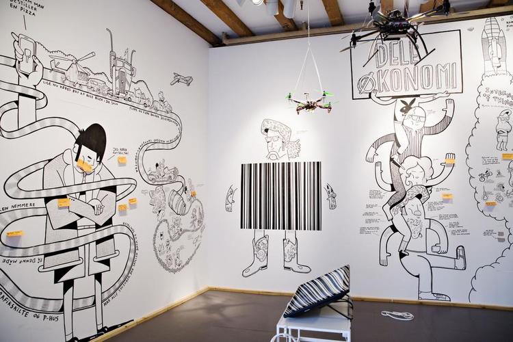Overblik. Dansk Arkitektur Center har fået streetkunstneren Mormor til at male et vægmaleri, der beskriver hvordan vores liv i byen bliver påvirket af digitaliseringen. 