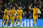 Måååål. Luis Suarez (th) blev Barcelonas redningsmand mod Atletico Madrid. 