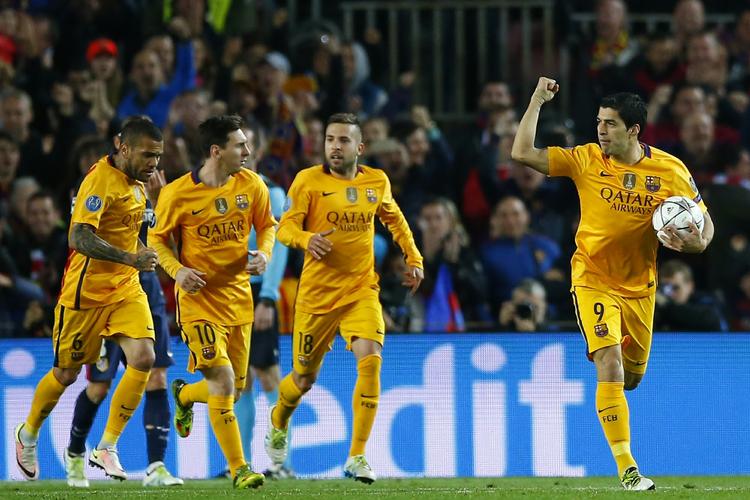 Måååål. Luis Suarez (th) blev Barcelonas redningsmand mod Atletico Madrid. 