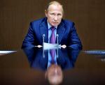 Lerfødder? Præsident Vladimir Putin er fortsat uhyre populær i den russiske befolkning. Alligevel strammer styret i Kreml grebet. Arkivfoto: Aleksej Drusjinin/AP 