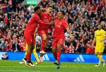 KASSE. Sturridge, Coutinho og Firmino i lykkeland, efter Liverpool er kommet foran hjemme på Anfield imod Villarreal. 