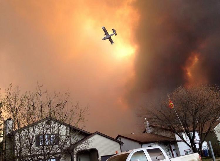Flammehav. Siden i tirsdags har en voldsom skovbrand hærget Canada. 