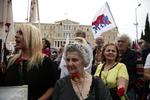 Demonstration. Politiet i Athen anslår, at næsten 15.000 mennesker marcherer gennem hovedstaden og Thessaloniki 