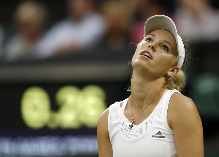 SKUFFET. Caroline Wozniacki havde glædet sig til at spille på Wimbledons Centre Court, men det blev ikke en mindeværdig oplevelse. 