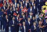 Indmach. Danske atleter blandt andre Mikkel Hansen fra håndboldlandsholdet går ind på det olympiske stadion ved åbningsceremonien. 