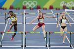 Overbevisende. Sara Slott Petersen (i midten) er klar til OL-finalen i 400 meter hæk. 