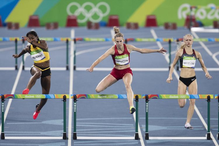 Overbevisende. Sara Slott Petersen (i midten) er klar til OL-finalen i 400 meter hæk. 