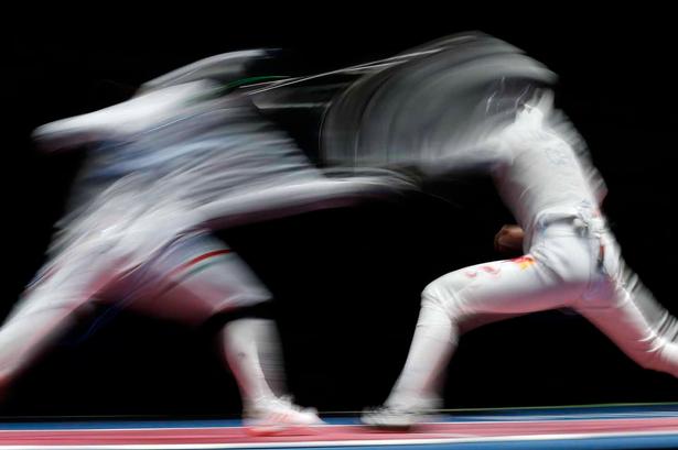 Fægtning - fra nogle af de indledende runder i kvindernes konkurrence. 