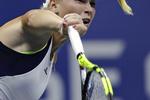 Caroline Wozniacki server. 
