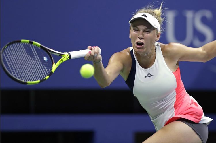 Walkover. Caroline Wozniacki havde let spil i US Open-kvartfinalen mod en skadet Sevastova. 