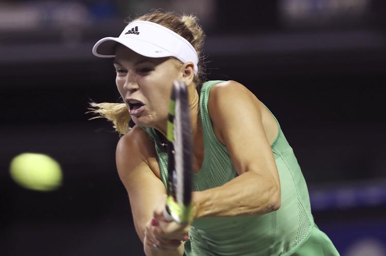 SEJR. Caroline Wozniacki viste tirsdag godt spil i Tokyo - ligesom ved US Open. 