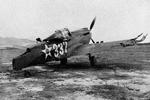 Dette amerikanske P-40-fly nåede aldrig på vingerne under det japanske angreb. 
