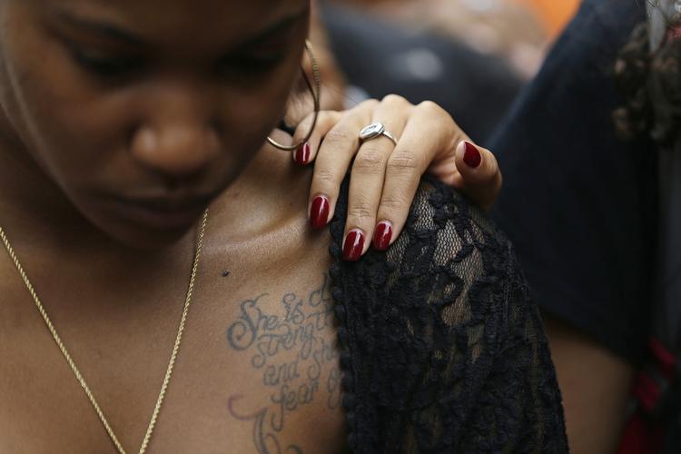 Sorg. Tidligere onsdag var der en mindehøjtidelighed i Charlotte for den dræbte Keith Lamont Scott. 