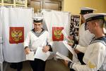 Soldater fra Ruslands Sortehavsflåde stemte ved det russiske parlamentsvalg på Krim sidste søndag. Det kan give op til fem års i Rusland at agitere for, at halvøen tilhører Ukraine. 