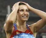 AFSLØRET. Anna Chicherova jubler her over sin bronzemedalje ved OL i Beijing i 2008. Men den skal nu afleveres tilbage på grund af doping. 