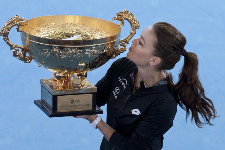 TILFREDS. Agnieszka Radwanska leverede varen hele ugen i Beijing, og søndag blev der derfor plads til denne populære aktivitet. 