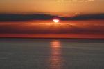 Bornholm. Bornholm i solnedgangens skær er et vidunderligt syn. Nyd det og husk, at øen kaldes for solskinsøen fordi der er flest solskinstimer her. Læserfoto: Frank Juel Pedersen 