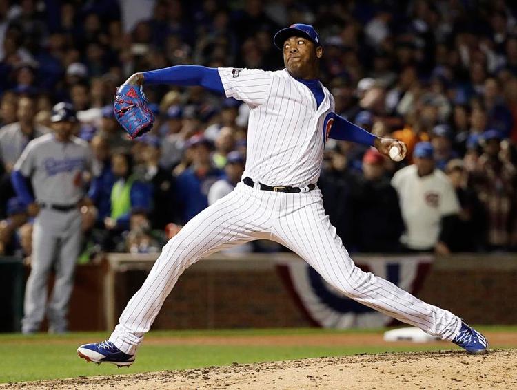 Forbandelse. Kaster Aroldis Chapman og de øvrige Chicago Cubs-spillere kan de kommende uger vinde det første mesterskab til klubben i 108 år, når de møder Cleveland Indians i finaleserien. Foto: David J. Phillip/AP 