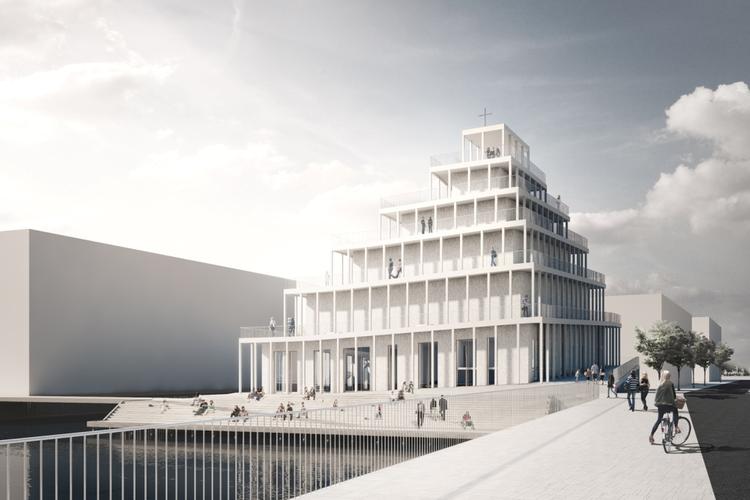 Udadvendt. Kirkens facade bliver omgivet af en promenade, hvor man i en spiralbevægelse kan gå helt fra vandkanten til korset på toppen. 