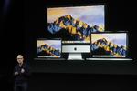STILLE. Lige siden den første Macintosh fra 1984, er Mac-brugere blevet mødt af en velkendt lyd, når maskinen startede op. Men den nye MacBook Pro (bill.) starter op i stilhed (Foto: AP Photo/Marcio José Sanchez). 