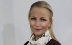 Karriere-mor. Det er trist at kvinder får det indtryk, at det ikke kan lade sig gøre at kombinere en karriere med en børnefamilie, mener Eva Persson, der har fundet sin egen model sammen med familien. Privatfoto. 