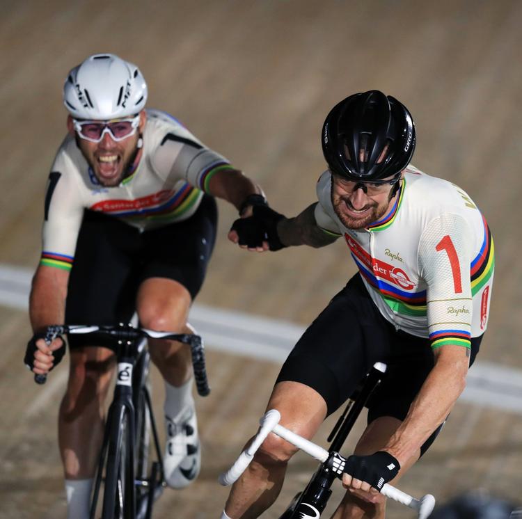 Afsked. Wiggins (th.) kører i Gent sammen med en anden britisk cykellegende, Mark Cavendish. 
