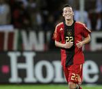 Så glad var han engang i den tyske landsholdtrøje, Mesut Özil, der her smiler efter en scoring mod Sydafrika. Nu er det slut med landsholdet og ham. ACHIM SCHEIDEMANN/DPA
