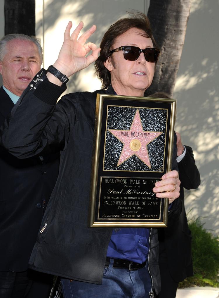 Paul McCartney får en stjerne på Hollywood Walk of Fame i 2011. 