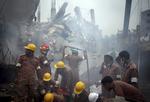 Sammenstyrtet: Den 24. april 2013 braste det flere etager høje Rana Plaza sammen – midt i dagens produktion af tøj. Over 1100 døde og omkring 2500 sårede. Katastrofestedet er et globaliseringens Ground Zero – symbolet på den globale arbejdsdeling med produktion af vores forbrugsvarer på den anden side af kloden under absurd elendige vilkår, skriver Trine Pertou Mach. 