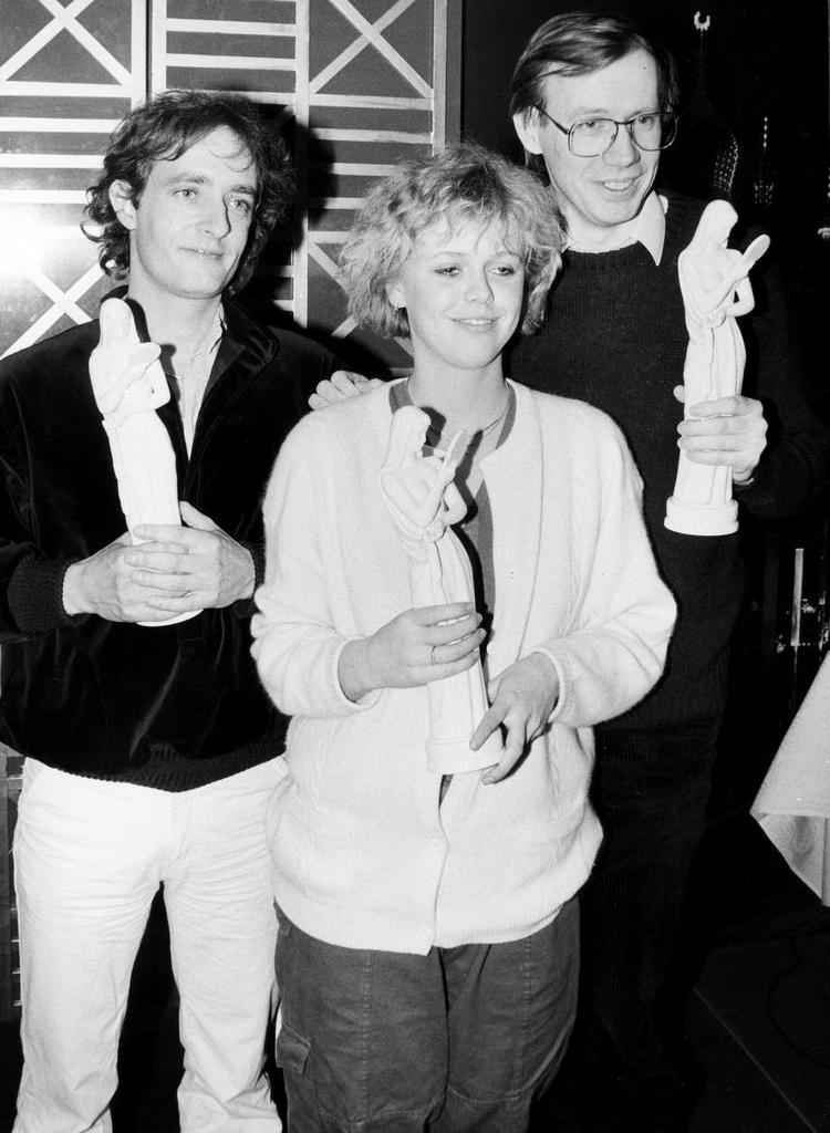 1984. Peter Hesse Overgård, Line Arlien-Søborg og Niels Malmros til Bodil-fest. Nils Malmros fik en Bodil for bedste film med 'Skønheden og udyret' - Line Arlien-Søborg for sin rolle i samme film. Foto: Richard Haines