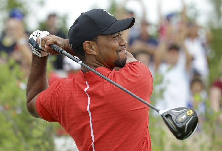 TILFREDS. Tiger Woods var meget langt fra sejren i Bahamas, men amerikaneren tror nu på et comeback. 