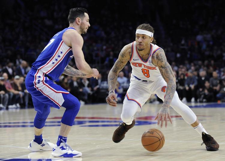 Philadelphia 76ers' spiller i blåt. Her mod New York Knicks. Michael Perez/AP