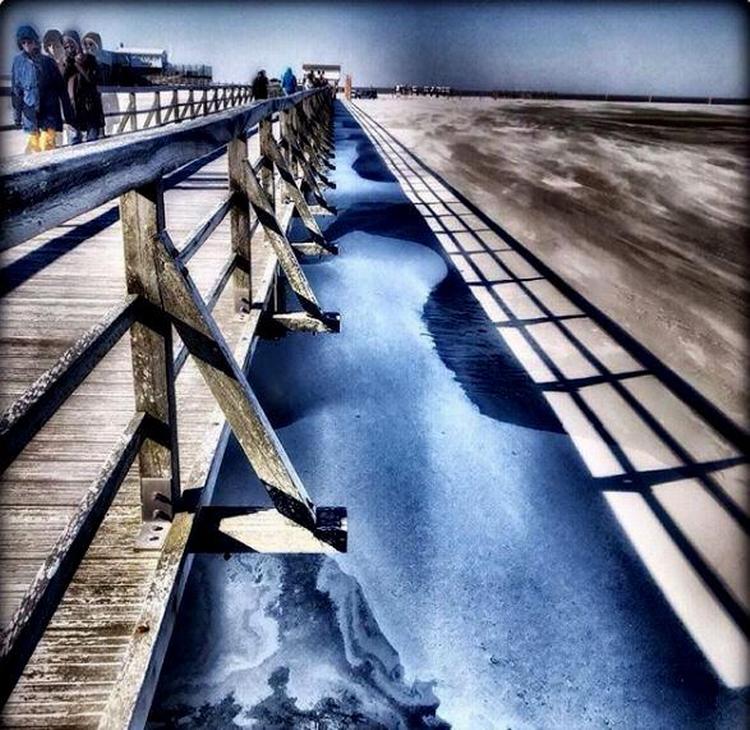 En frossen Nordstrand ved Sankt Peter-Ording i Tyskland.   @syledis